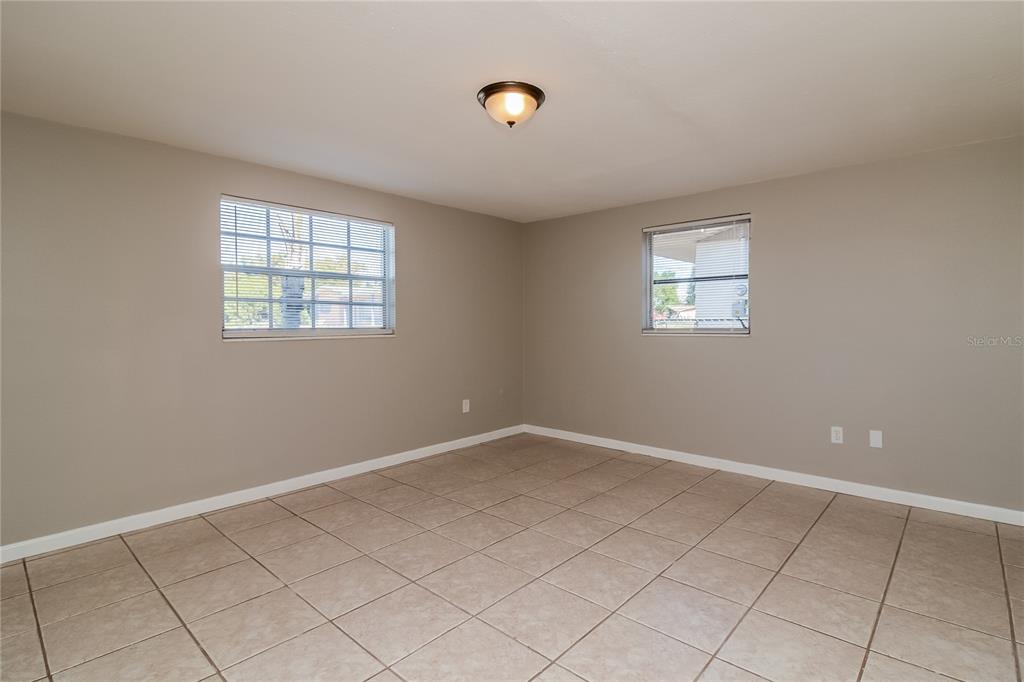 3824 Moog Road Holiday, FL 34691 - Photo 11 of 16 a view of an empty room with window