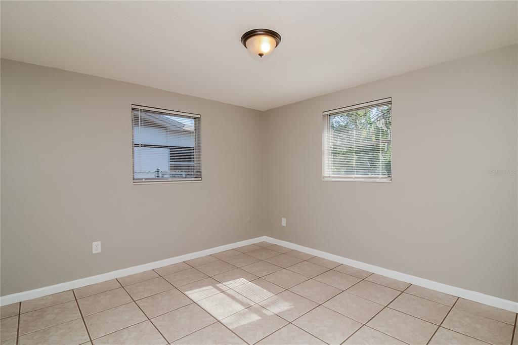 3824 Moog Road Holiday, FL 34691 - Photo 12 of 16 an empty room with windows