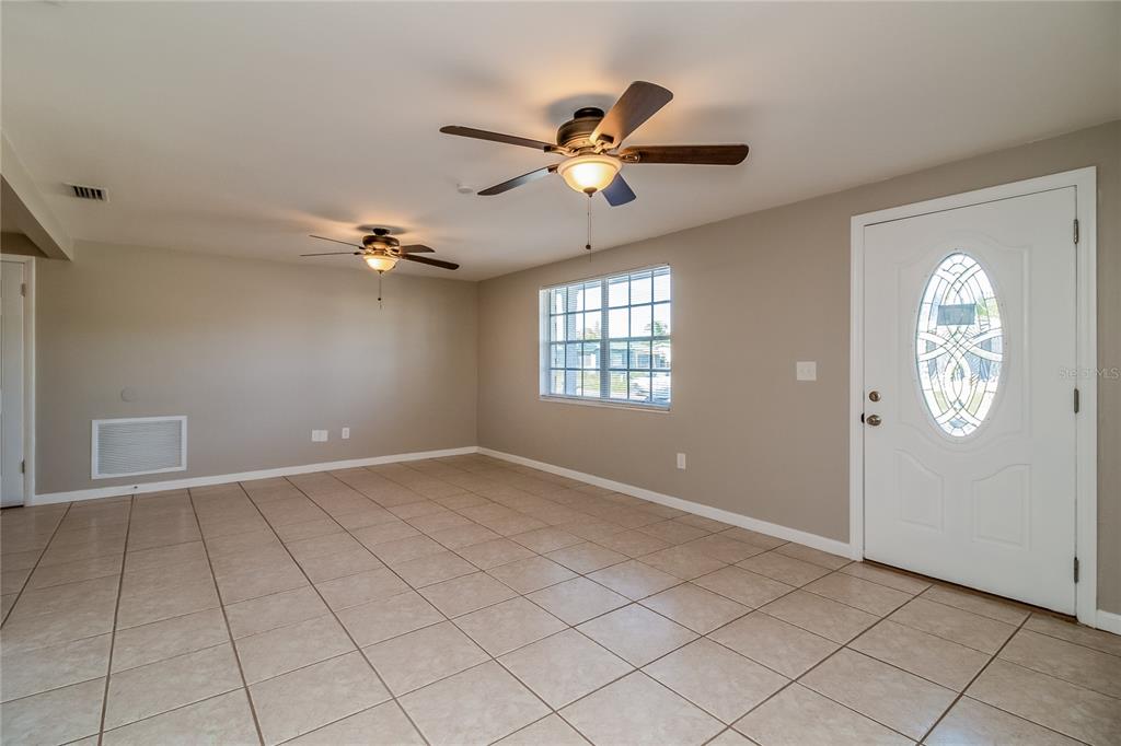 3824 Moog Road Holiday, FL 34691 - Photo 2 of 16 a view of an empty room and window