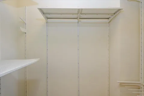 a view of small space with racks on the wall
