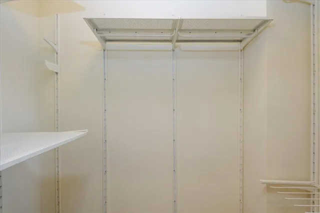 a view of small space with racks on the wall