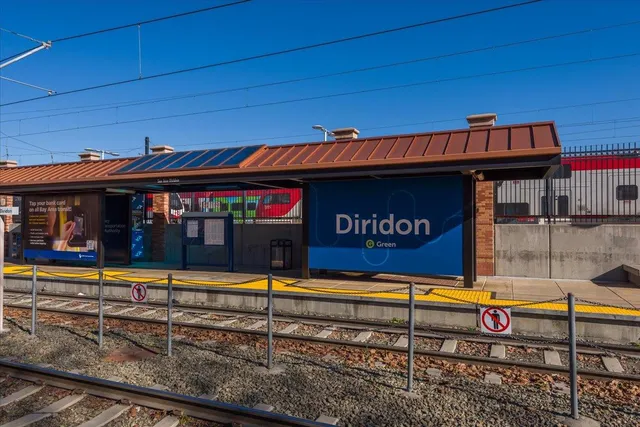 a view of a cafe with sitting area