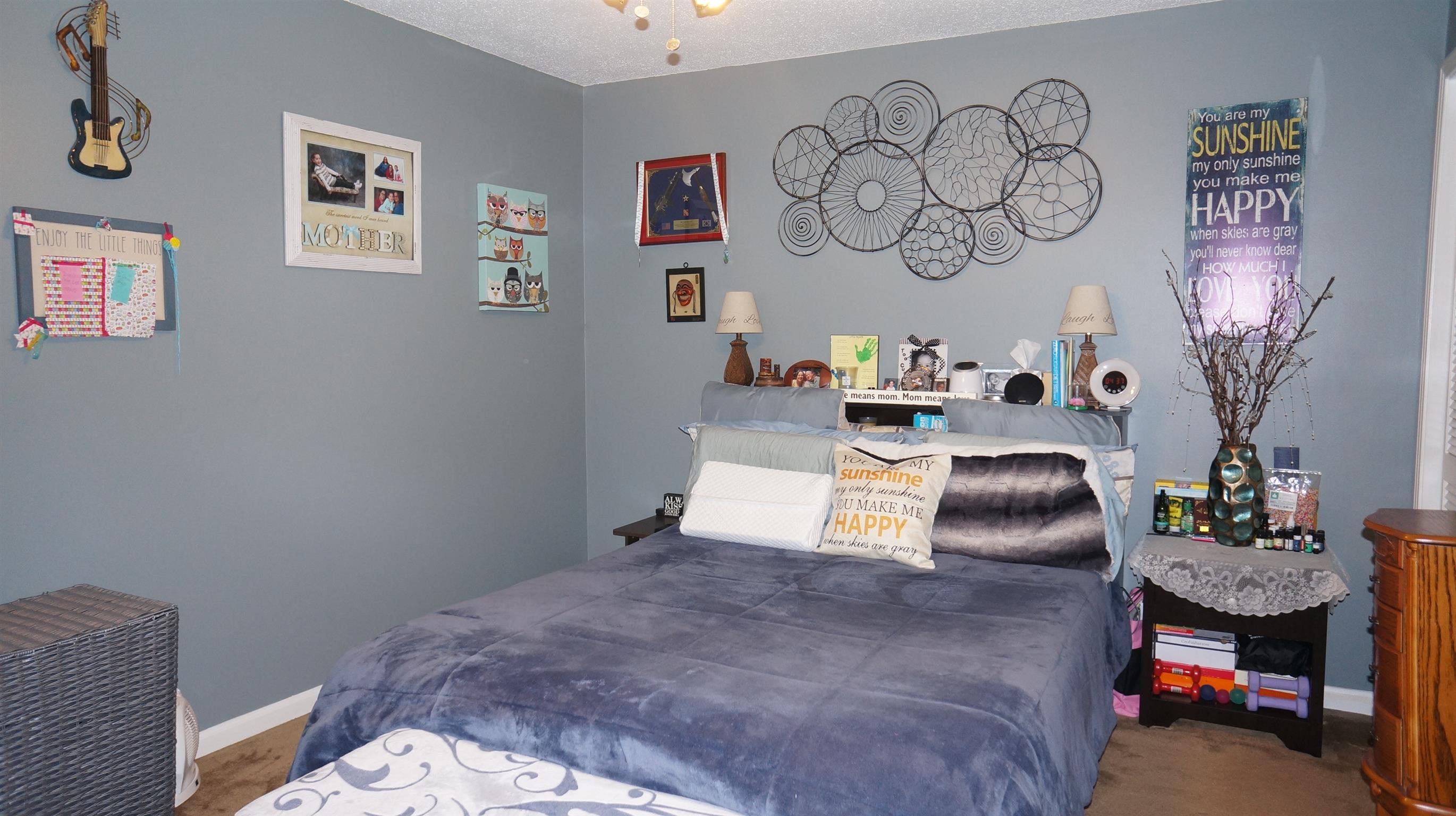 2168 Post Road Clarksville, TN 37043 - Photo 8 of 13 a bedroom with a bed and dresser