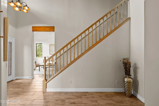 a view of entryway with wooden floor