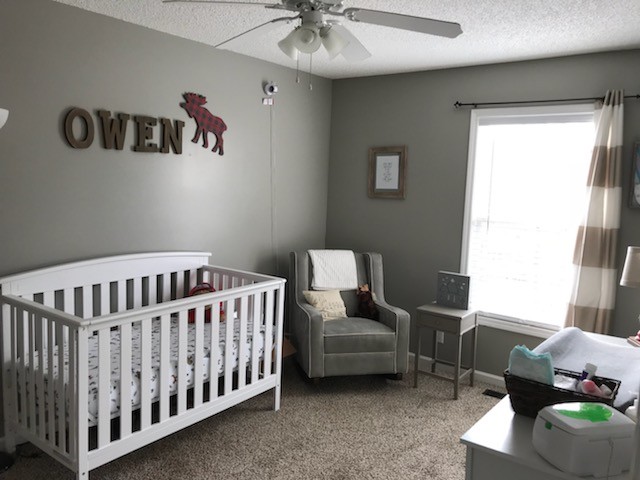 1740 Hazelwood Road Clarksville, TN 37040 - Photo 12 of 20 a bedroom with furniture and a window