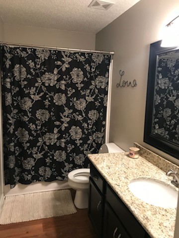 1740 Hazelwood Road Clarksville, TN 37040 - Photo 14 of 20 a bathroom with a granite countertop sink and a toilet