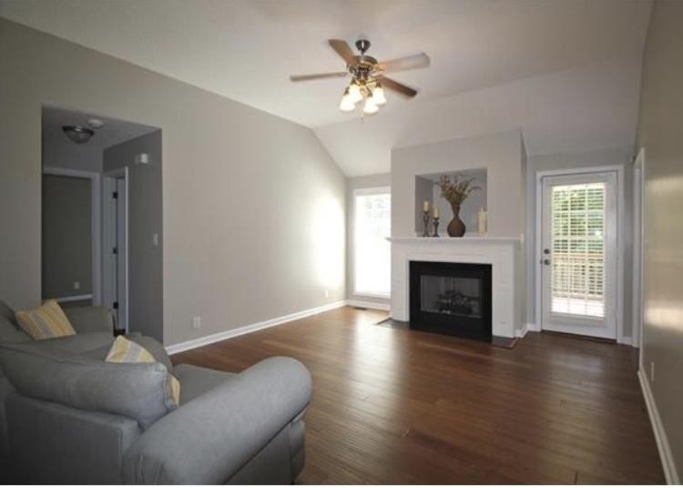 1740 Hazelwood Road Clarksville, TN 37040 - Photo 3 of 20 a living room with furniture and a fireplace