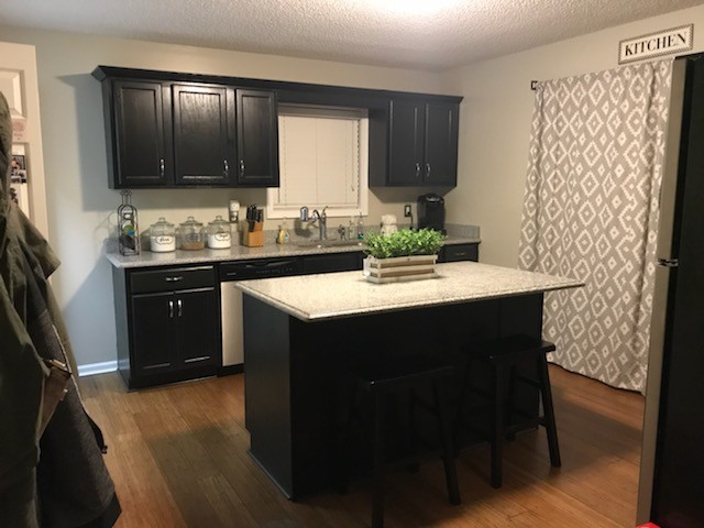 1740 Hazelwood Road Clarksville, TN 37040 - Photo 5 of 20 a kitchen with a sink and cabinets