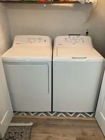 a utility room with dryer and washer