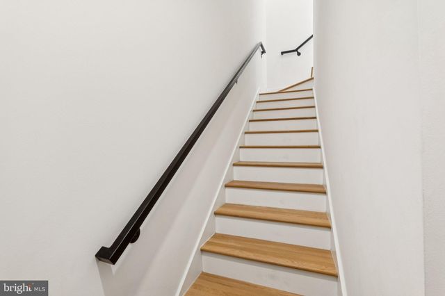 a balcony with wooden floor