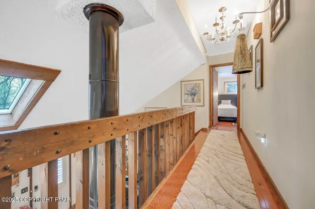 a view of a porch with wooden floor