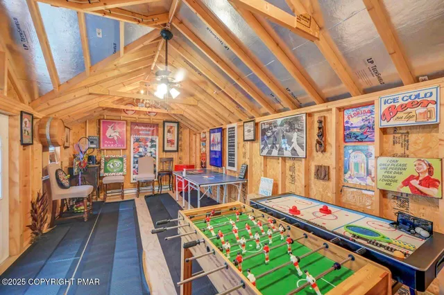 a reading room with furniture and wooden floor