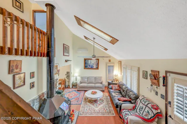 a bed room with furniture and a window