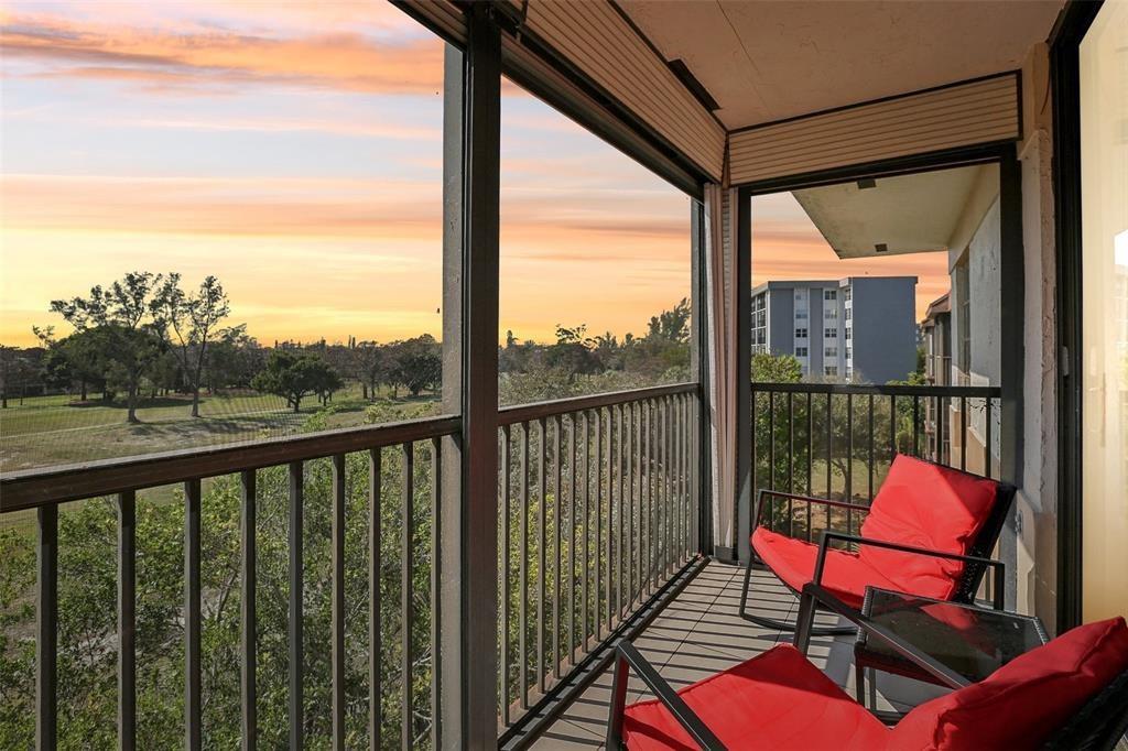 5570 Northwest 44th Street, Unit 510A Lauderhill, FL 33319 - Photo 1 of 25 a view of a city from a balcony with furniture