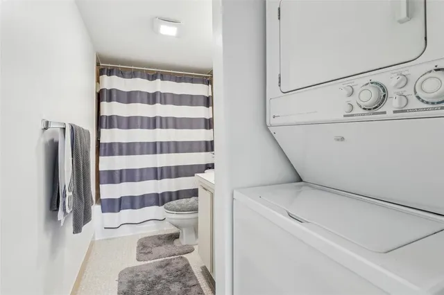 a bathroom with a sink and a shower curtain