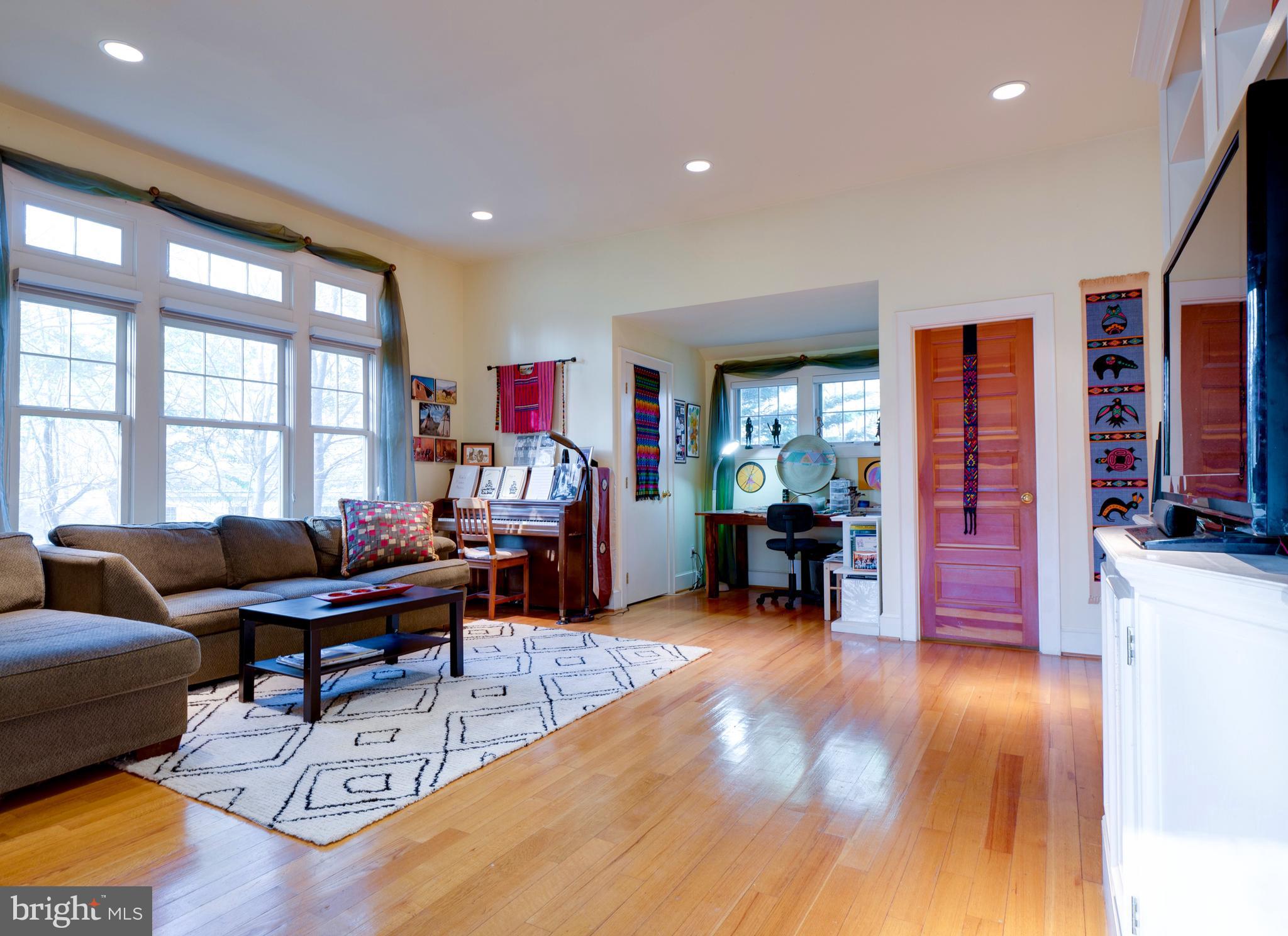 6306 Valley Road Bethesda, MD 20817 - Photo 29 of 74 a living room with furniture and wooden floor