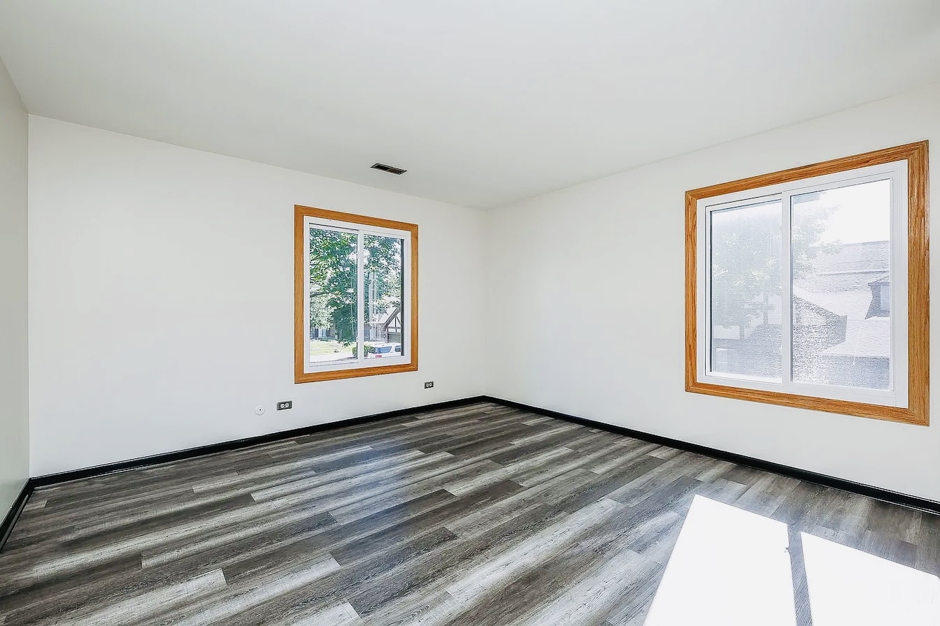 865 Sheldon Court, Unit C Wheaton, IL 60189 - Photo 10 of 11 a view of an empty room with window