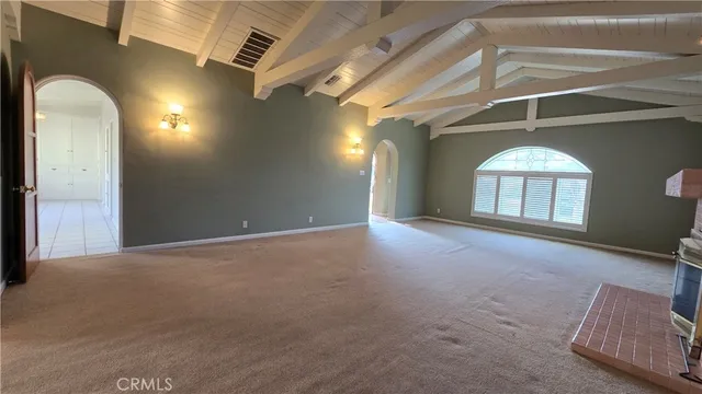 a view of a livingroom with a staircase