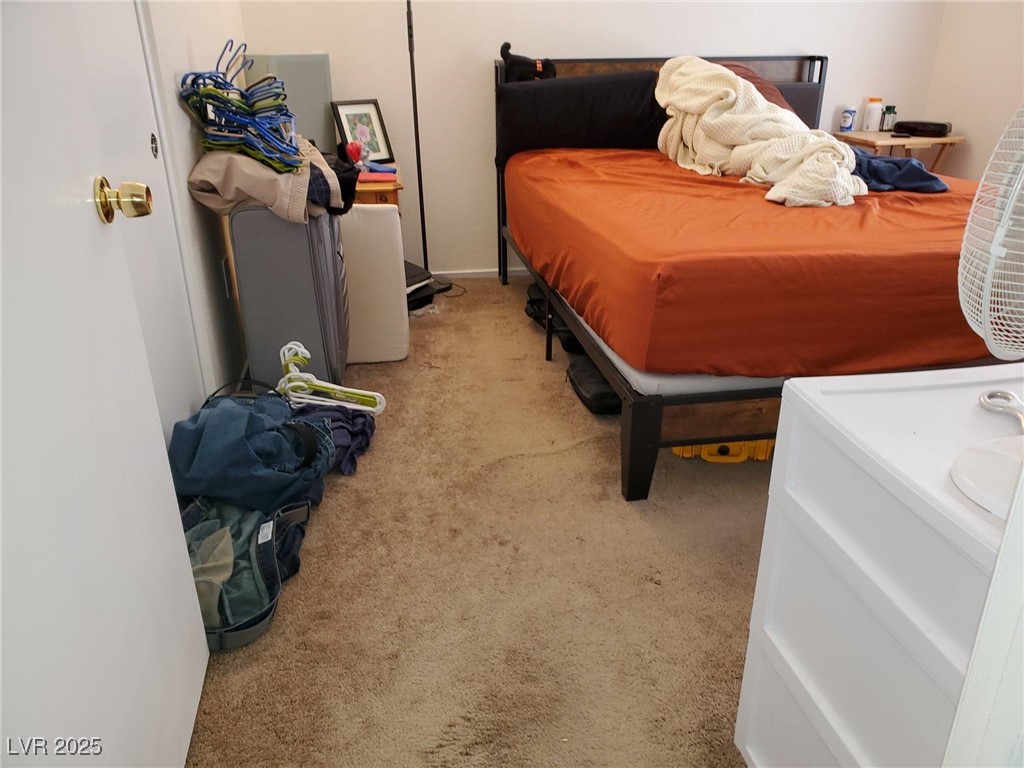 8070 West Russell Road, Unit 1005 Las Vegas, NV 89113 - Photo 12 of 12 Bedroom with light colored carpet