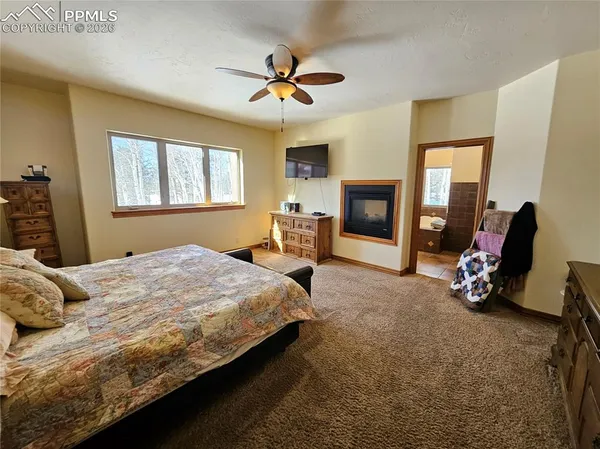 a bedroom with a bed and furniture