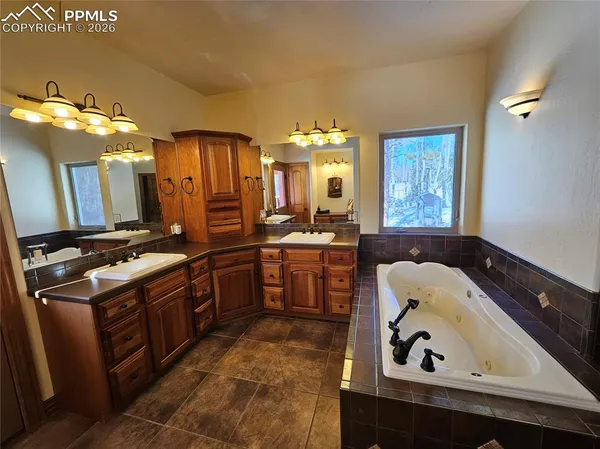 a kitchen with a stove and a refrigerator