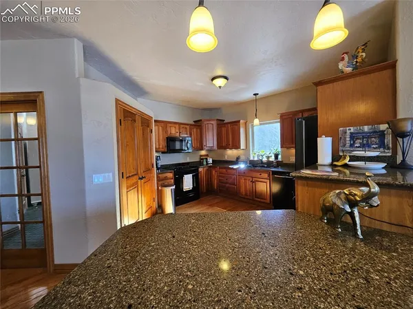 a view of a kitchen and dining room