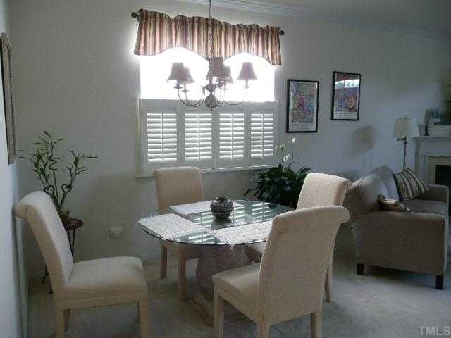 8510 Arboles Court Raleigh, NC 27613 - Photo 3 of 11 Separate dining area. Home has custom shutters and blinds