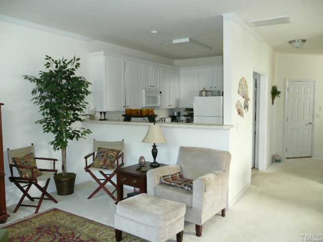 8510 Arboles Court Raleigh, NC 27613 - Photo 6 of 11 View into Kitchen from family room