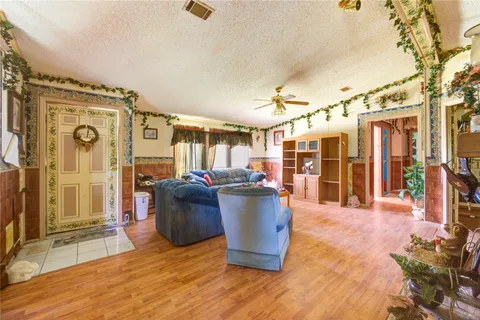 a living room with lots of furniture and shower