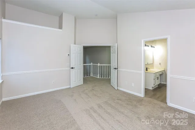 a view of a room with cabinet and entryway
