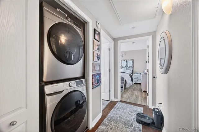 a view of a hallway with washer and dryer