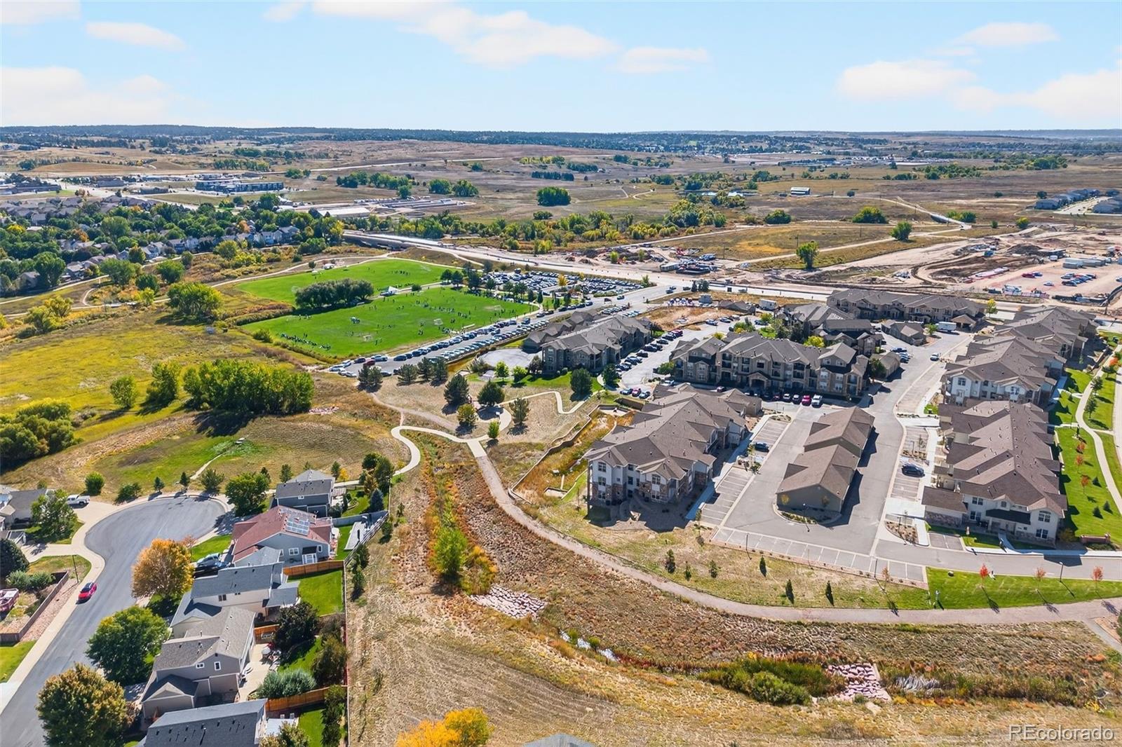 18669 Stroh Road, Unit 10005 Parker, CO 80134 - Photo 16 of 18 an aerial view of a residential houses with outdoor space