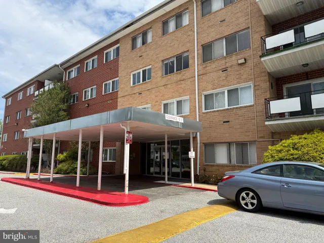 a car parked in front of a building