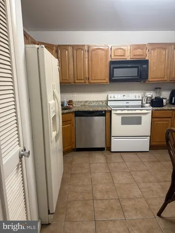 a view of a balcony with yard