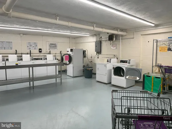 a storage room with washer and dryer