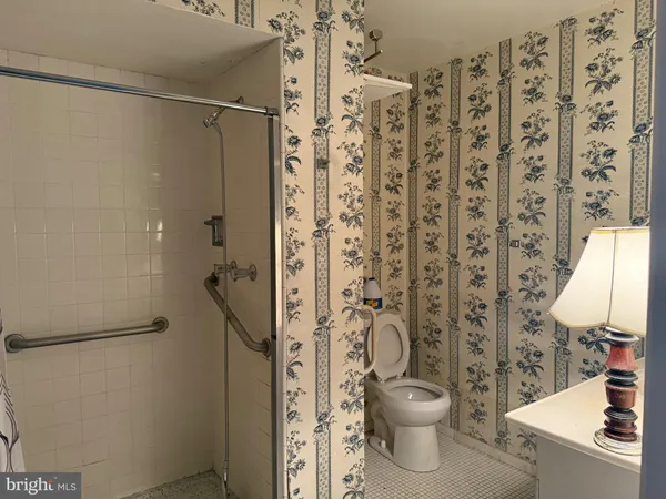 a room with a bed and a window