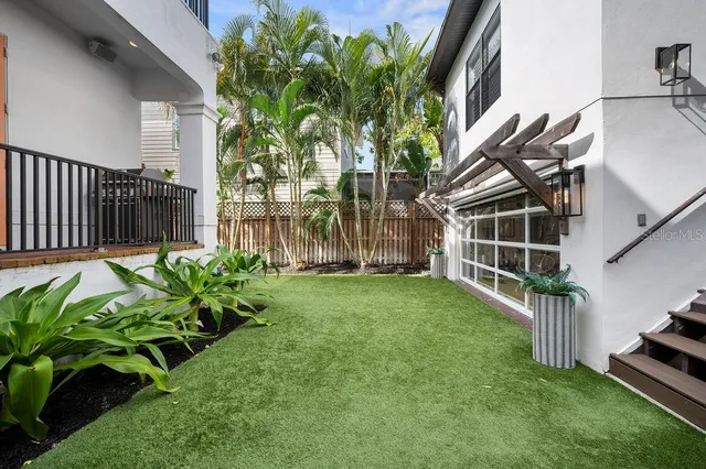 a view of a house with a garden