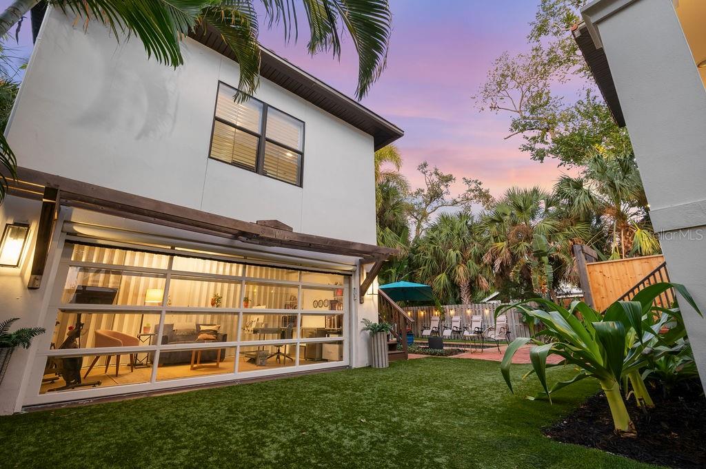 1723 Oak Street Sarasota, FL 34236 - Photo 24 of 34 a view of a chair and table in front of house