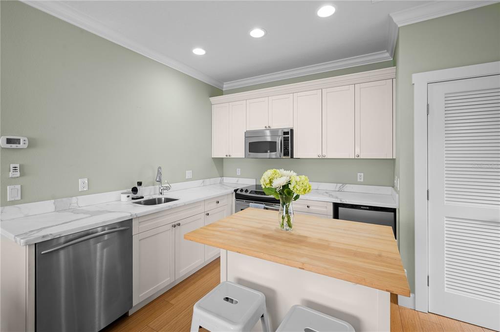 1723 Oak Street Sarasota, FL 34236 - Photo 27 of 34 a kitchen with a sink appliances and cabinets