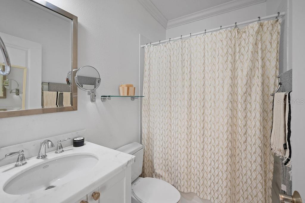 1723 Oak Street Sarasota, FL 34236 - Photo 29 of 34 a bathroom with a sink toilet and shower