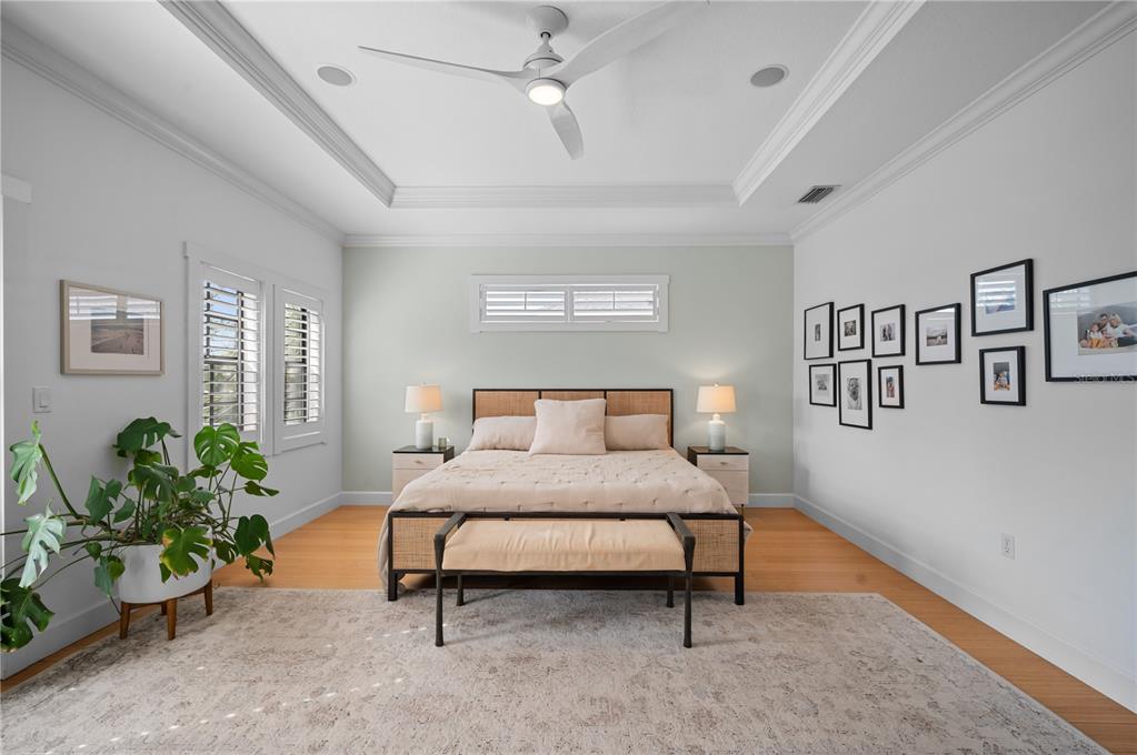 1723 Oak Street Sarasota, FL 34236 - Photo 10 of 34 a bedroom with a bed and potted plant