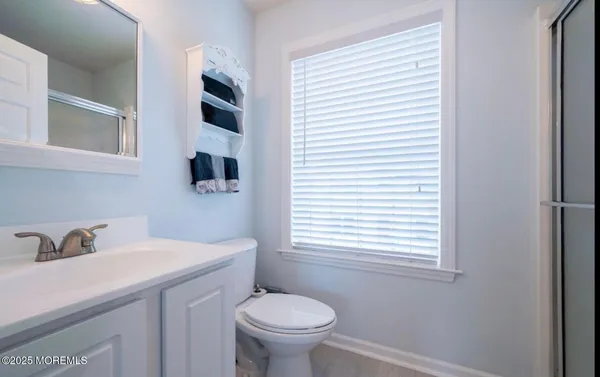 a bathroom with a sink and a toilet