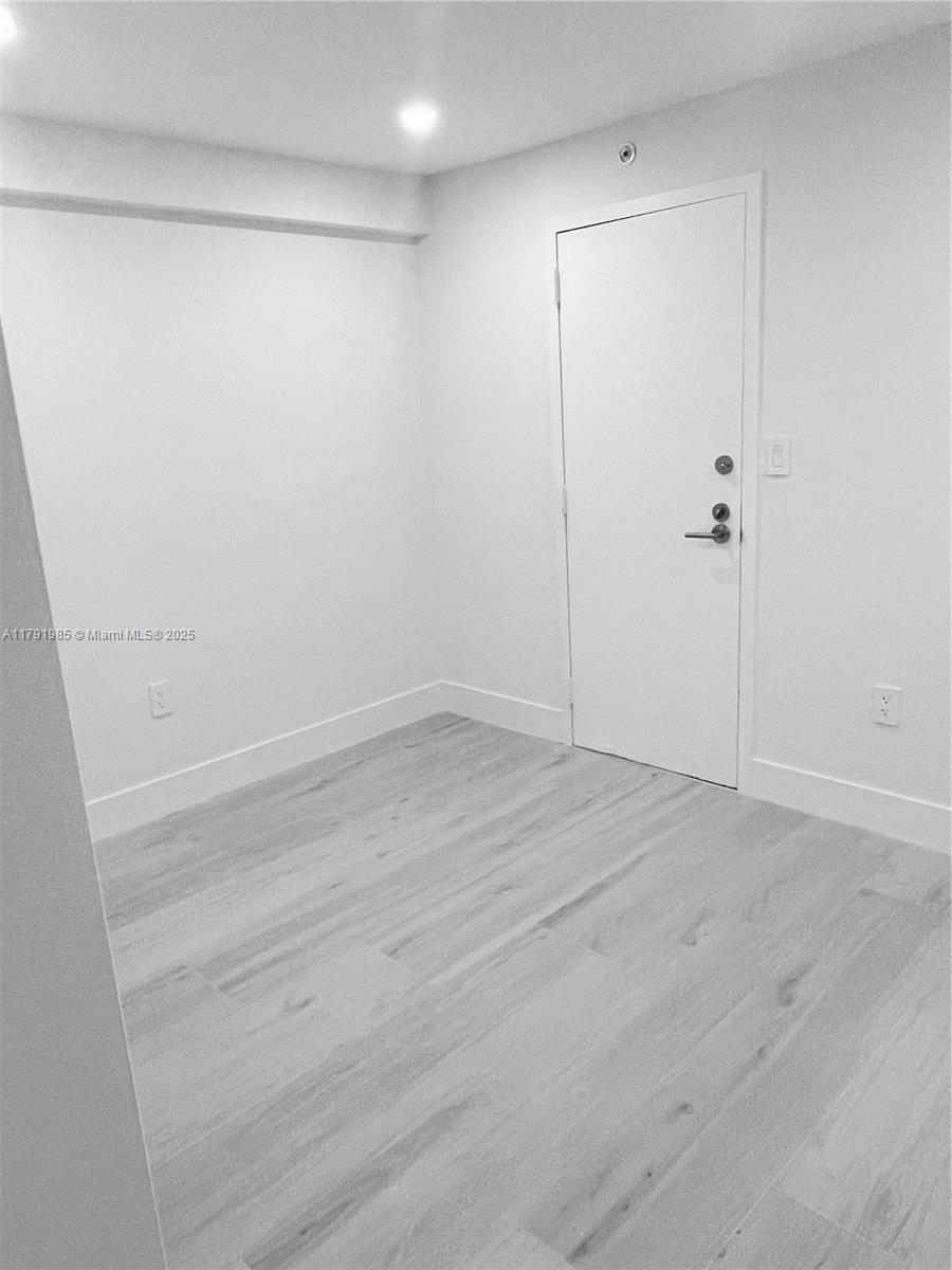 575 Crandon Boulevard, Unit 307 Key Biscayne, FL 33149 - Photo 14 of 37 a view of an empty room