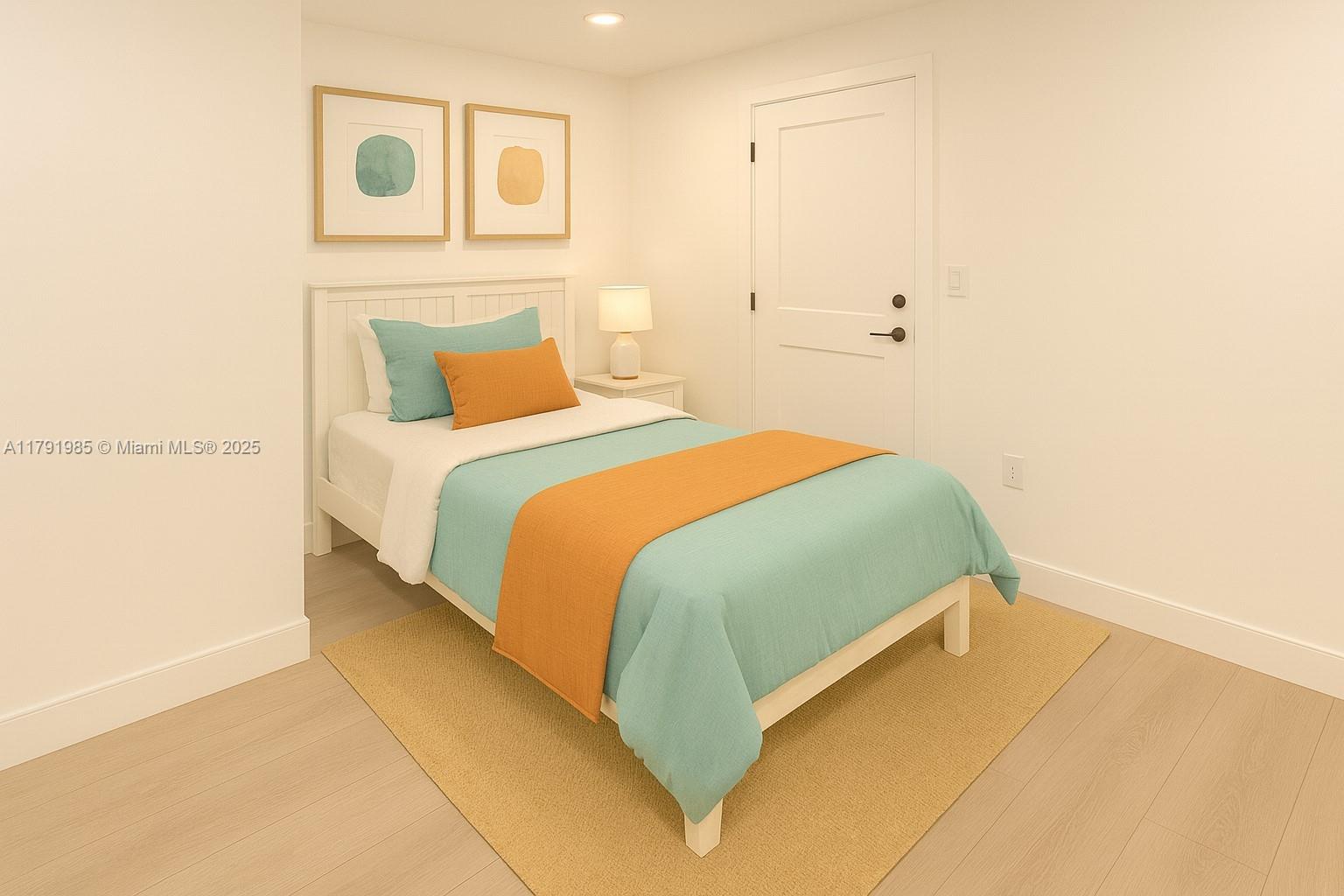 575 Crandon Boulevard, Unit 307 Key Biscayne, FL 33149 - Photo 15 of 37 a bedroom with a bed and a painting