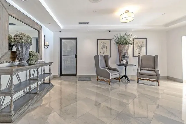 a view of a livingroom with furniture and window