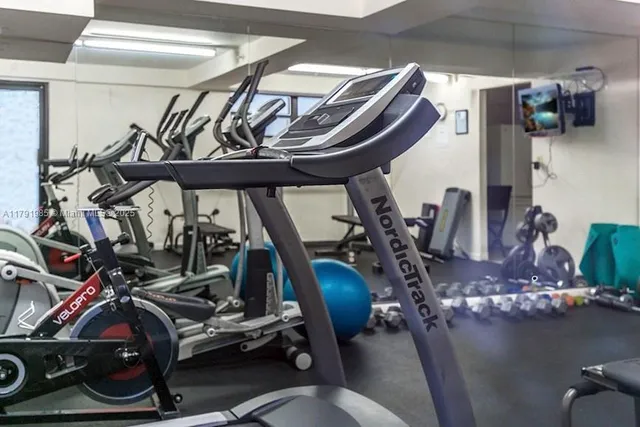 a view of a room with gym equipment