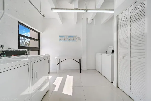 a bathroom with a sink a mirror and a bathtub