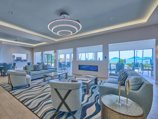 a view of a swimming pool with a yard