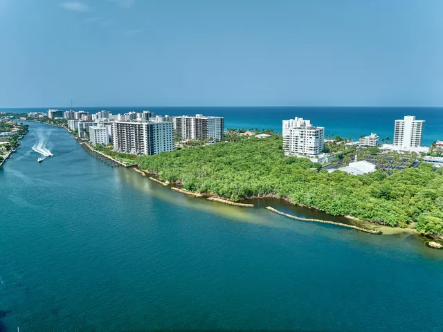 a view of swimming pool of a yard and outdoor seating