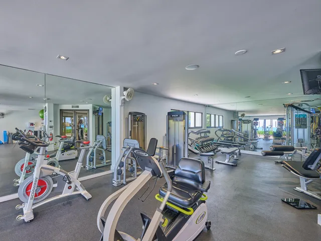 a bedroom with bed and a window